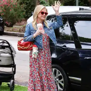 Kathy Hilton strolls in a Beverly Hills Park with her pups and on-brand Labubus on July 22, 2025 in Beverly Hills, California.