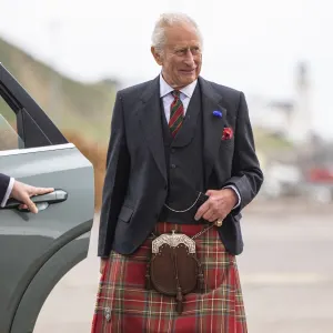 King Charles Rocks a Red Kilt in Scotland: See His Festive Outfit
