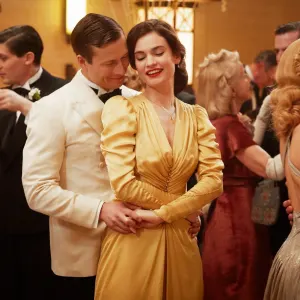 Glen Powell and Lily James inThe Guernsey Literary and Potato Peel Pie Society