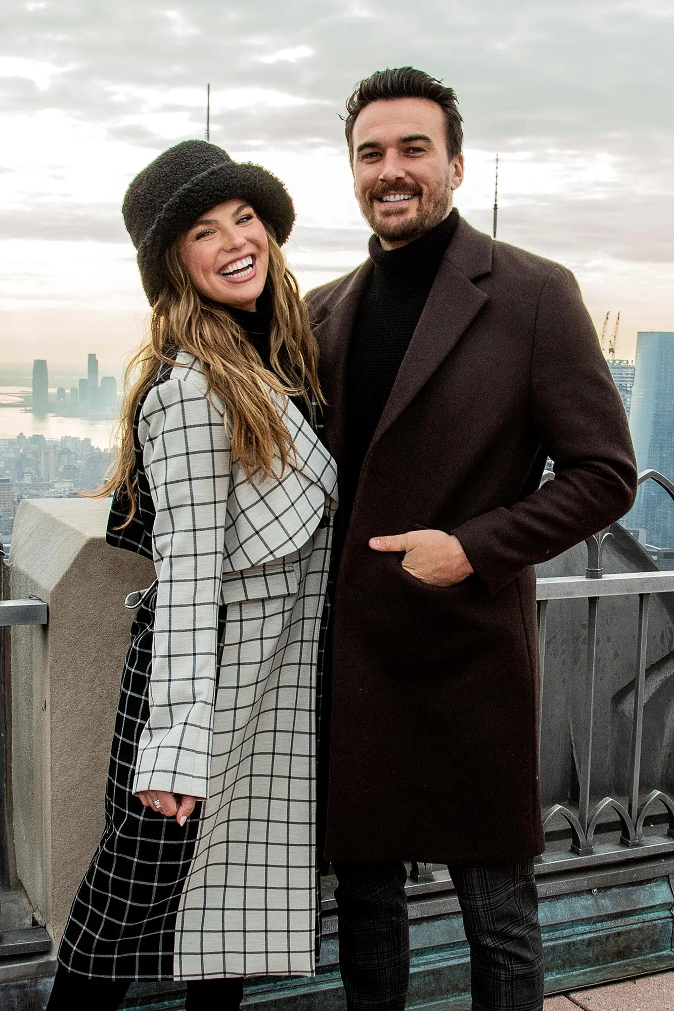 Hannah Brown Lets Fiance Adam Carry Her Wedding Dress Into Airport Ahead of Nuptials GettyImages 1358317798