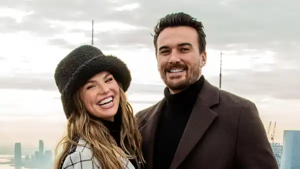 Hannah Brown Lets Fiance Adam Carry Her Wedding Dress Into Airport Ahead of Nuptials GettyImages 1358317798