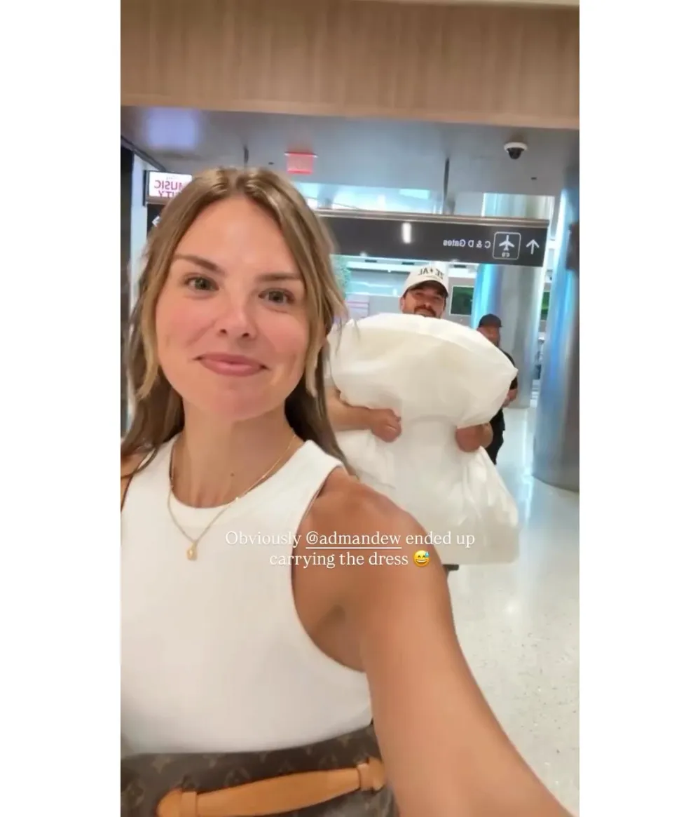 Hannah Brown Lets Fiance Adam Carry Her Wedding Dress Into Airport Ahead of Nuptials IG Story 2