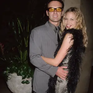 Julian-McMahon-and-Brooke-Burns-GettyImages-1370650896