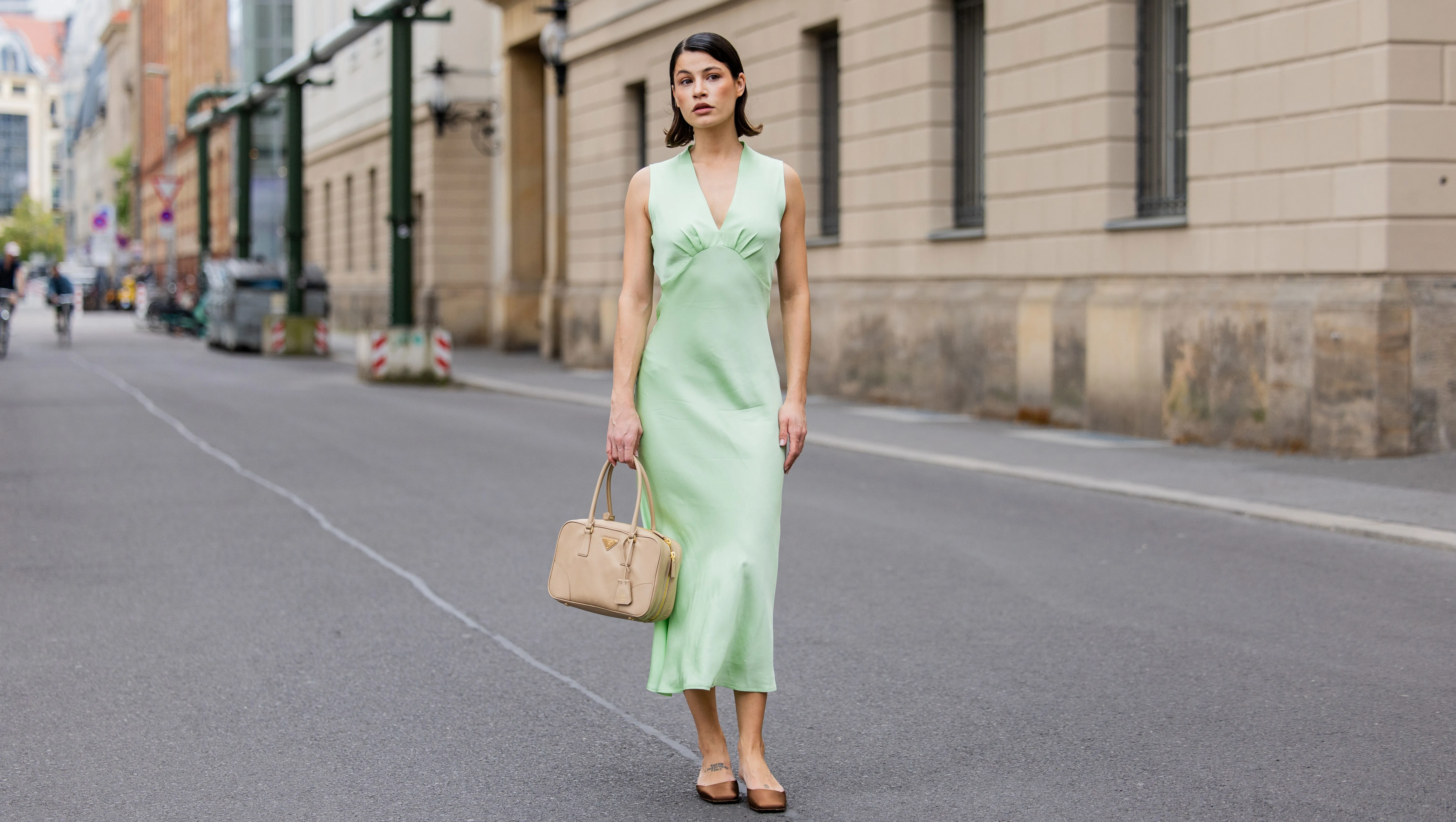 BERLIN, GERMANY - MAY 05: Lea Naumann wears mint green sleeveless dress : ottod'Ame, beige bag Prada, brown silk heels Prada on May 05, 2024 in Berlin, Germany. (Photo by Christian Vierig/Getty Images)