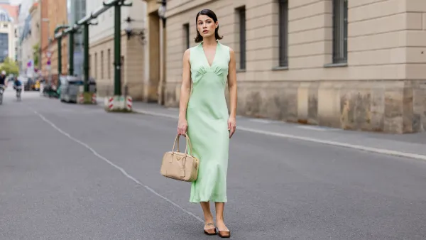 BERLIN, GERMANY - MAY 05: Lea Naumann wears mint green sleeveless dress : ottod'Ame, beige bag Prada, brown silk heels Prada on May 05, 2024 in Berlin, Germany. (Photo by Christian Vierig/Getty Images)