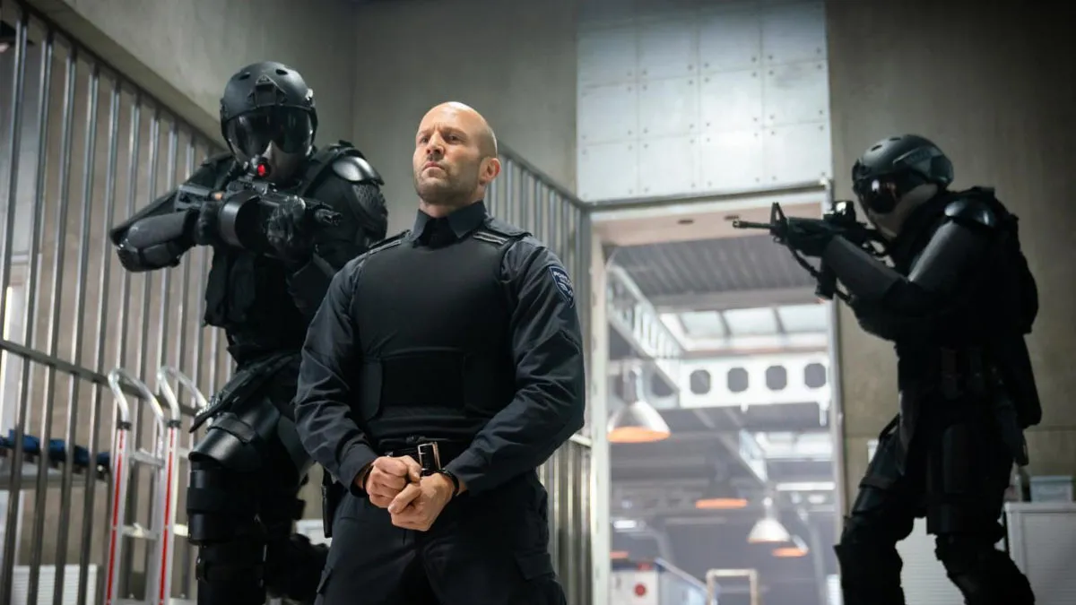 Jason Statham is held at gun point in Wrath of Man