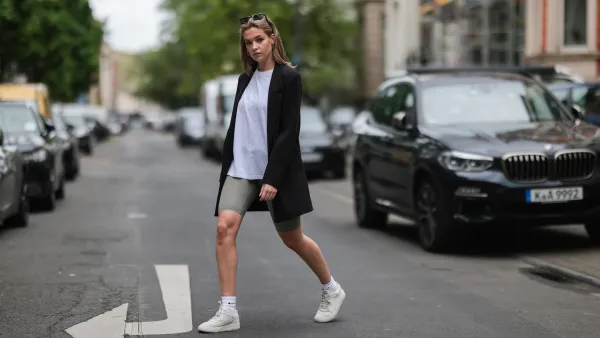 COLOGNE, GERMANY - MAY 12: Tessa Augstein wearing black Vero Moda blazer, white H&M shirt, grey Zara biker shorts, white Nike logo socks and offwhite Copenhagen studios sneakers via The Wants Shoes on May 12, 2021 in Cologne, Germany. (Photo by Jeremy Moeller/Getty Images)