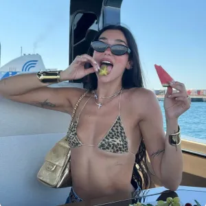 Dua Lipa Sizzles in a Tiny Underboob-Baring Bikini: ‘Having a Good Time’