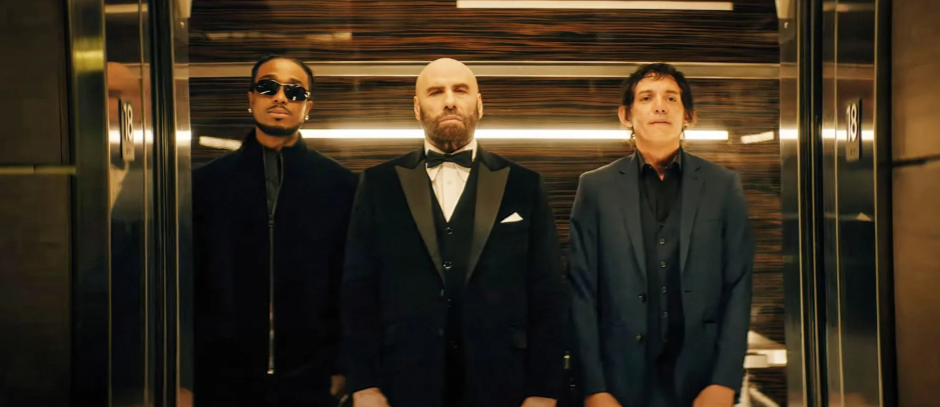 Quavo, John Travolta, Lukas Haas in High Rollers