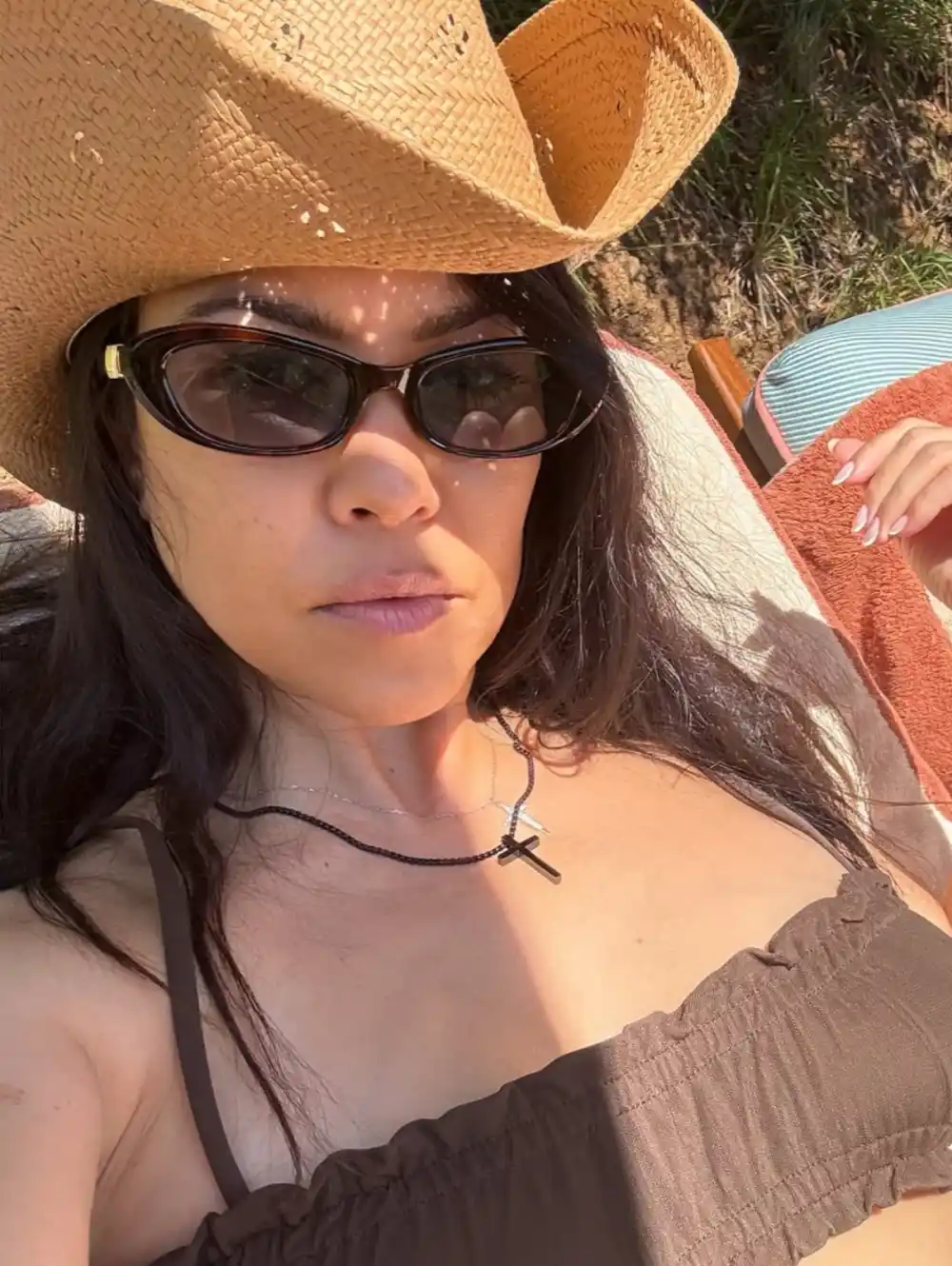 Kourtney Kardashian Slams Pregnancy Rumors After Trip to Italy With Travis Barker