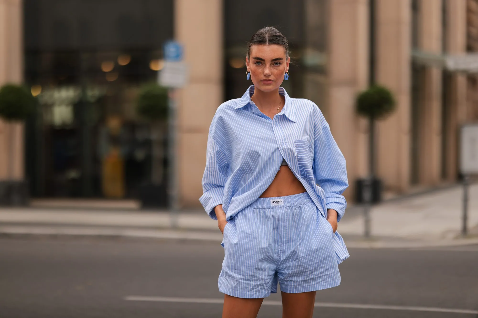 BERLIN, GERMANY - AUGUST 16: Celine Bethmann wearing blue striped Worst Behavior two piece on August 16, 2021 in Berlin, Germany. (Photo by Jeremy Moeller/Getty Images)