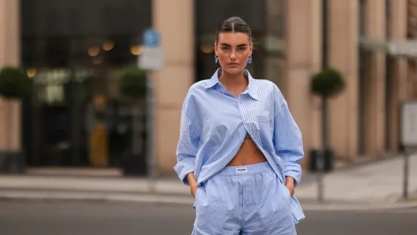 BERLIN, GERMANY - AUGUST 16: Celine Bethmann wearing blue striped Worst Behavior two piece on August 16, 2021 in Berlin, Germany. (Photo by Jeremy Moeller/Getty Images)