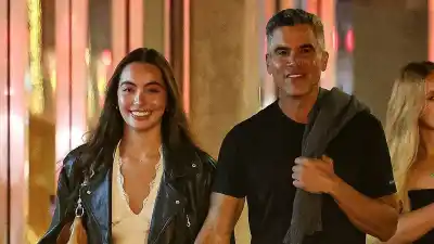 Cash Warren and Hana Sun Doerr Holding Hands BGUS_3324590_010