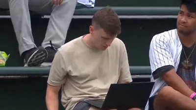Chicago Cubs Fan Goes Viral For Working on His Laptop In Bleachers During Game