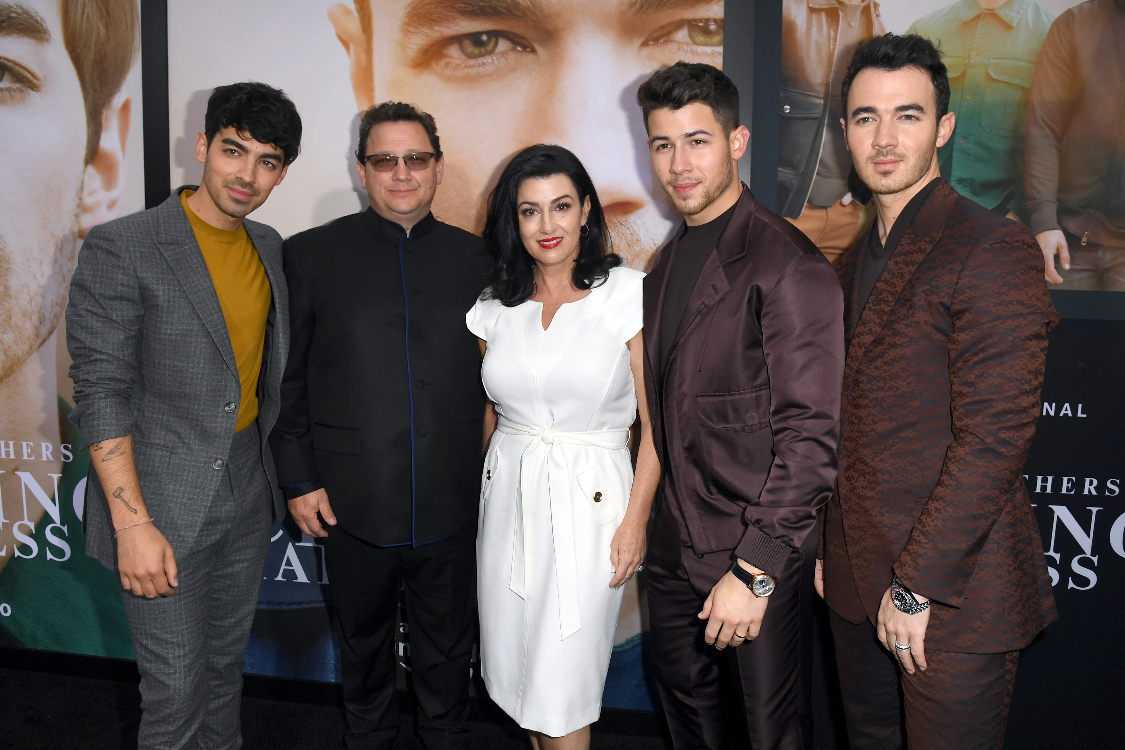 Joe Jonas, Kevin Jonas Sr., Denise Jonas, Nick Jonas and Kevin Jonas attending the "Chasing Happiness" premiere.