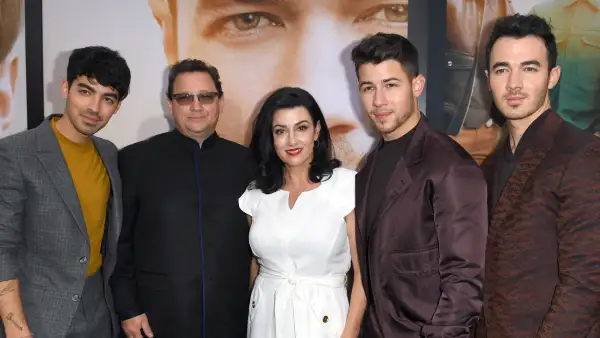 Joe Jonas, Kevin Jonas Sr., Denise Jonas, Nick Jonas and Kevin Jonas attending the "Chasing Happiness" premiere.