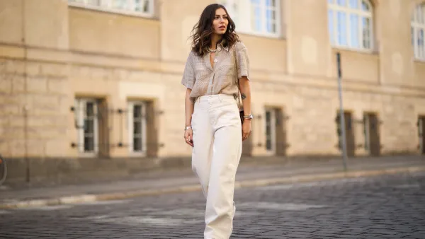 Masha Sedgwick (Maria Astor) wearing Nobi Talai blouse, Agneel bag, Closed jeans and Coach sneaker on May 06, 2020 in Berlin, Germany.