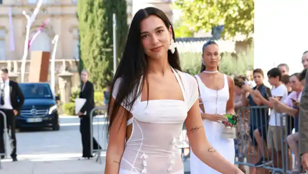 Dua Lipa Speaks Out About Wearing 'Naked' White Dress as a Wedding Guest After It Caused a 'Stir'