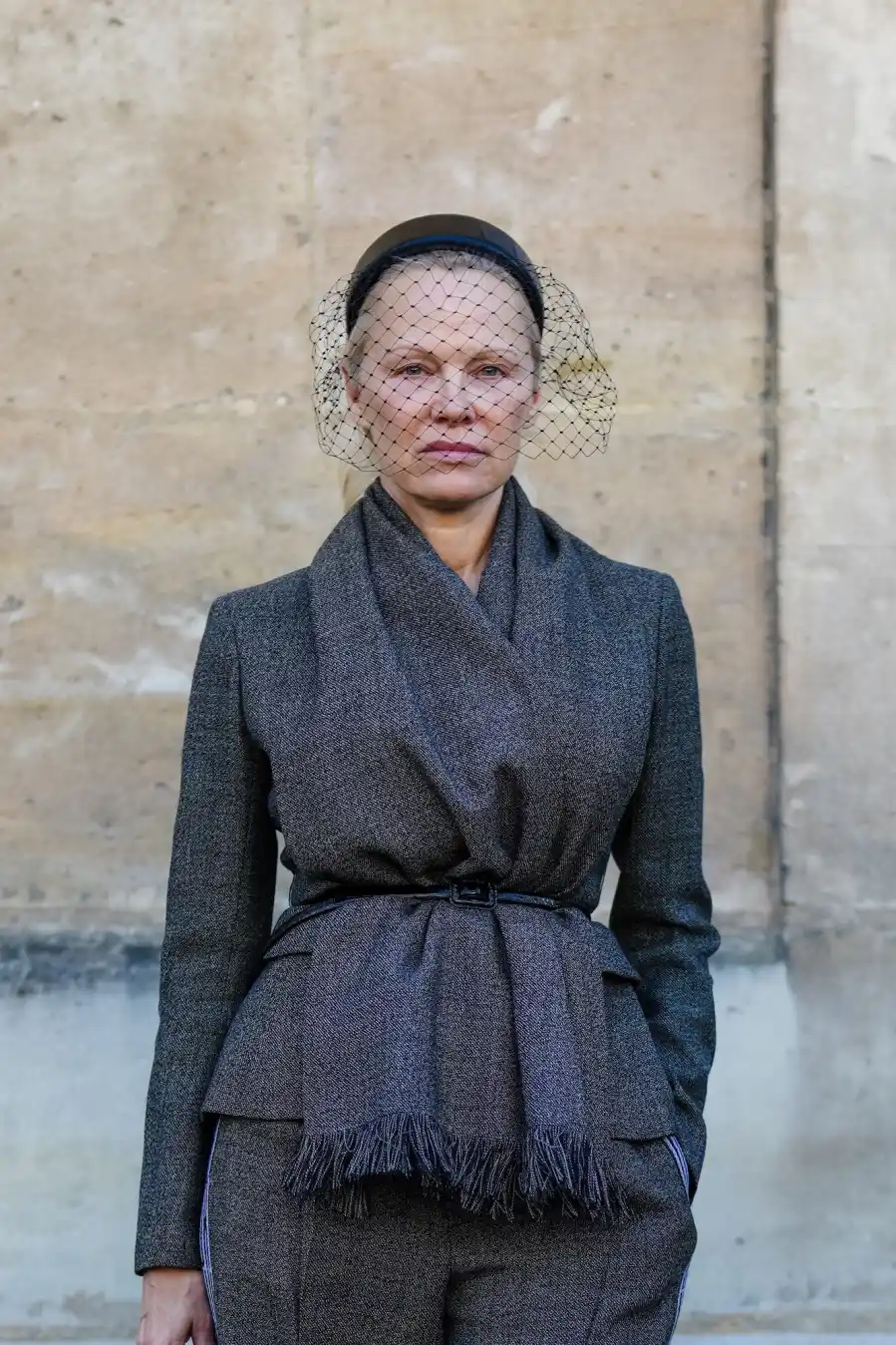 GettyImages-2196294242 Pamela Anderson's Makeup-Free Photos Since She Started Going Natural