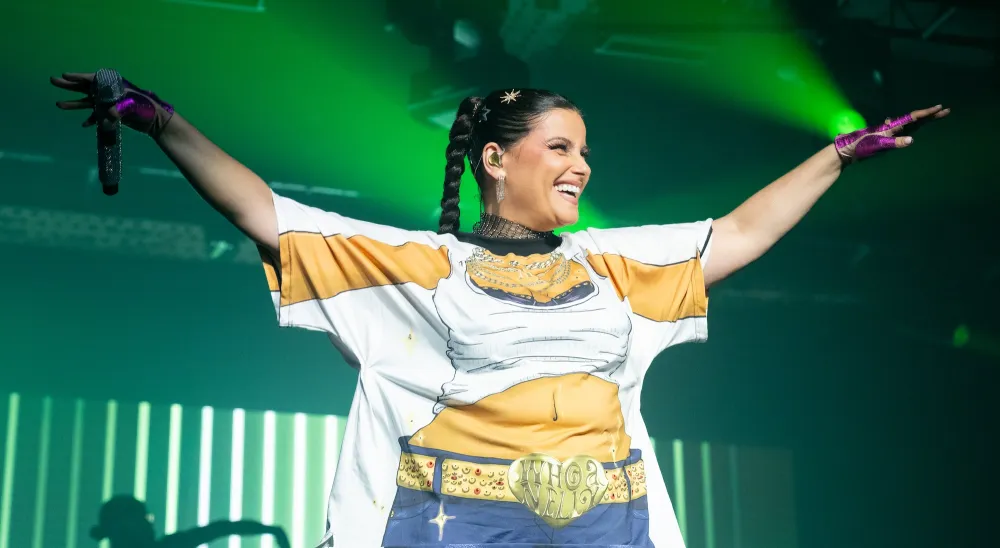 Nelly Furtado Defies Body-Shamers in 'Better Than Ever' T-Shirt During Manchester Performance