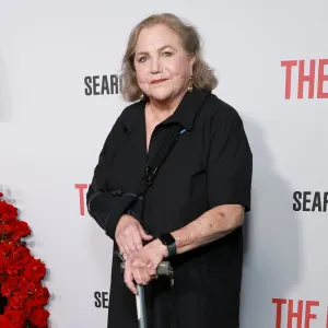 GettyImages2232086840 Kathleen Turner Steps Out for Rare Appearance at The Roses Premiere