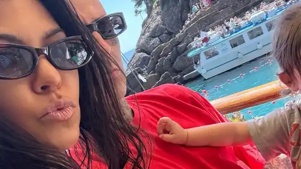 Kourtney Kardashian Rocks Plunging Leopard Swimsuit in Family Photos After Slamming Pregnancy Rumors 001 PROMO