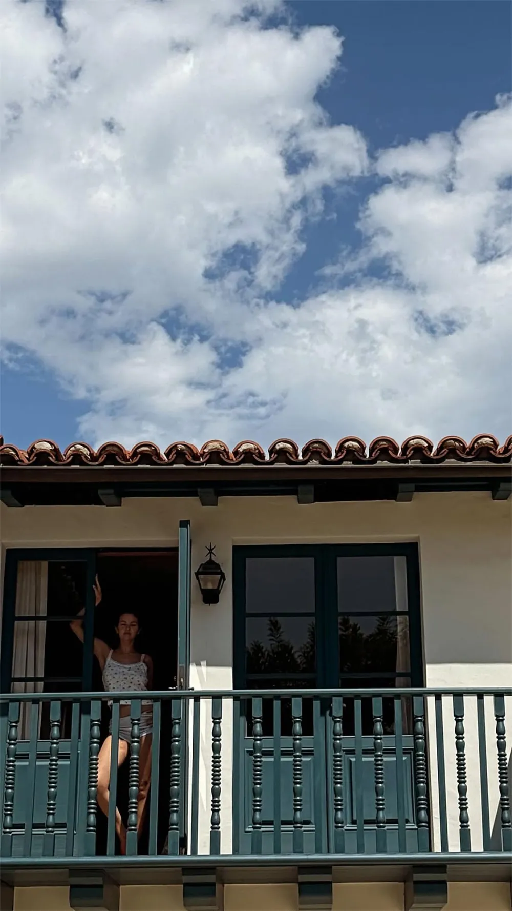 Selena Gomez Flaunts Her Sexy Side in Boyshorts While Posing on a Balcony