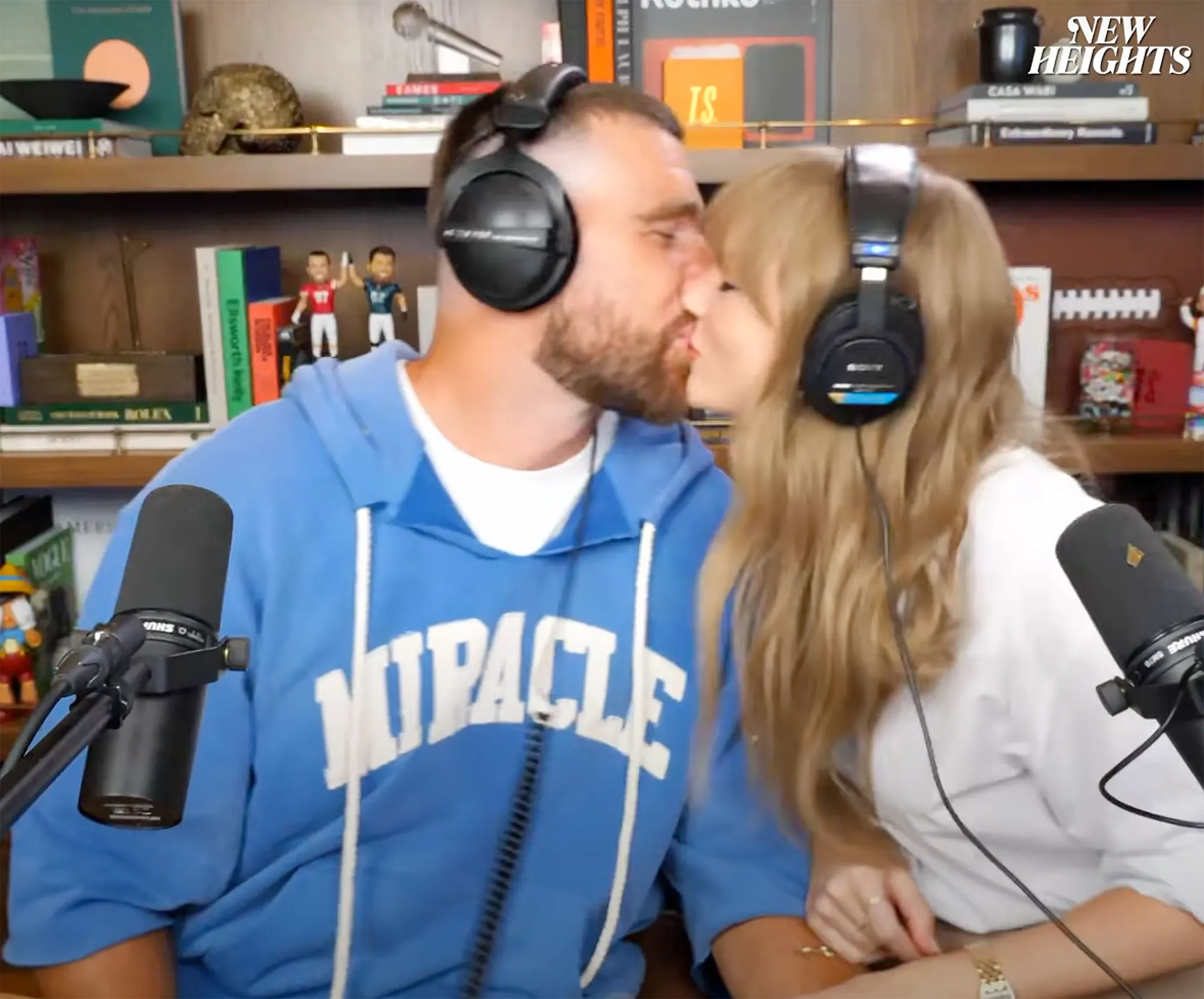 Taylor Swift and Travis Kelce Kiss on New Heights