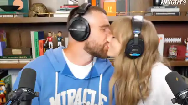 Taylor Swift and Travis Kelce Kiss on New Heights