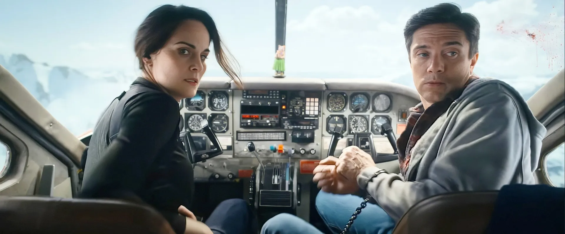 Michelle Dockery and Topher Grace in Flight Risk