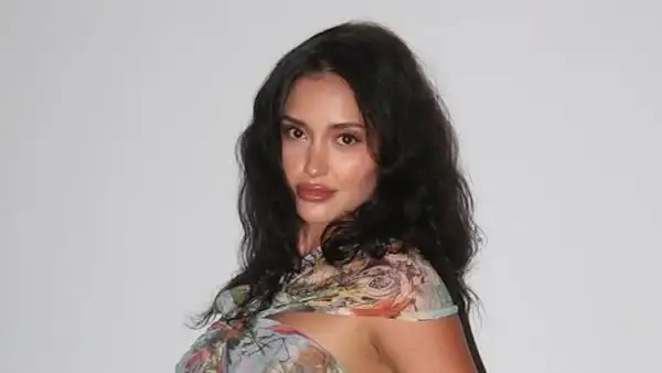 Leah Kateb Defends Her Curves After Troll Claims She's Sticking Her Chest Out in Photos