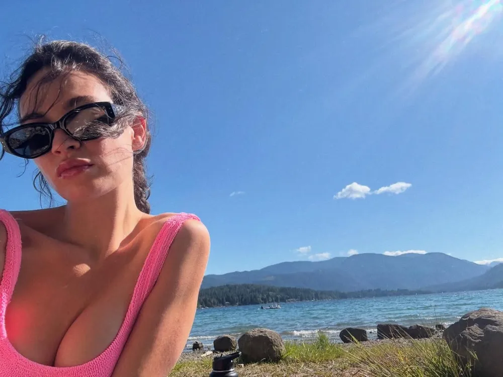 Lily James Strips Down to Her Birthday Suit and Shows Off Her Tan Lines