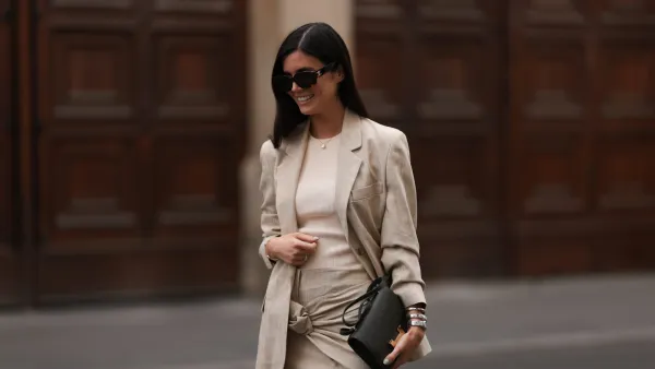 BERLIN, GERMANY - MAY 19: Leo Eberlin seen wearing Zara linen beige long blazer, Zara matching linen flower mini skirt, Celine brown shades, Hermes Constance mini leather bag, Zara beige top, black heels and Bulgari Serpenti stainless steel watch and Leo Mathild diamond / gold jewelry on May 19, 2023 in Berlin, Germany. (Photo by Jeremy Moeller/Getty Images)