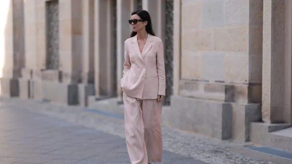 BERLIN, GERMANY - FEBRUARY 25: Leo Eberlin seen wearing YSL brown tortoise sunglasses, Leo Mathild diamond jewelry / rings and bracelet, Marc Cain light pink elegant blazer jacket, matching Marc Cain light pink elegant wide leg suit pants and Marc Cain silver leather heels, on February 25, 2024 in Berlin, Germany. (Photo by Jeremy Moeller/Getty Images)