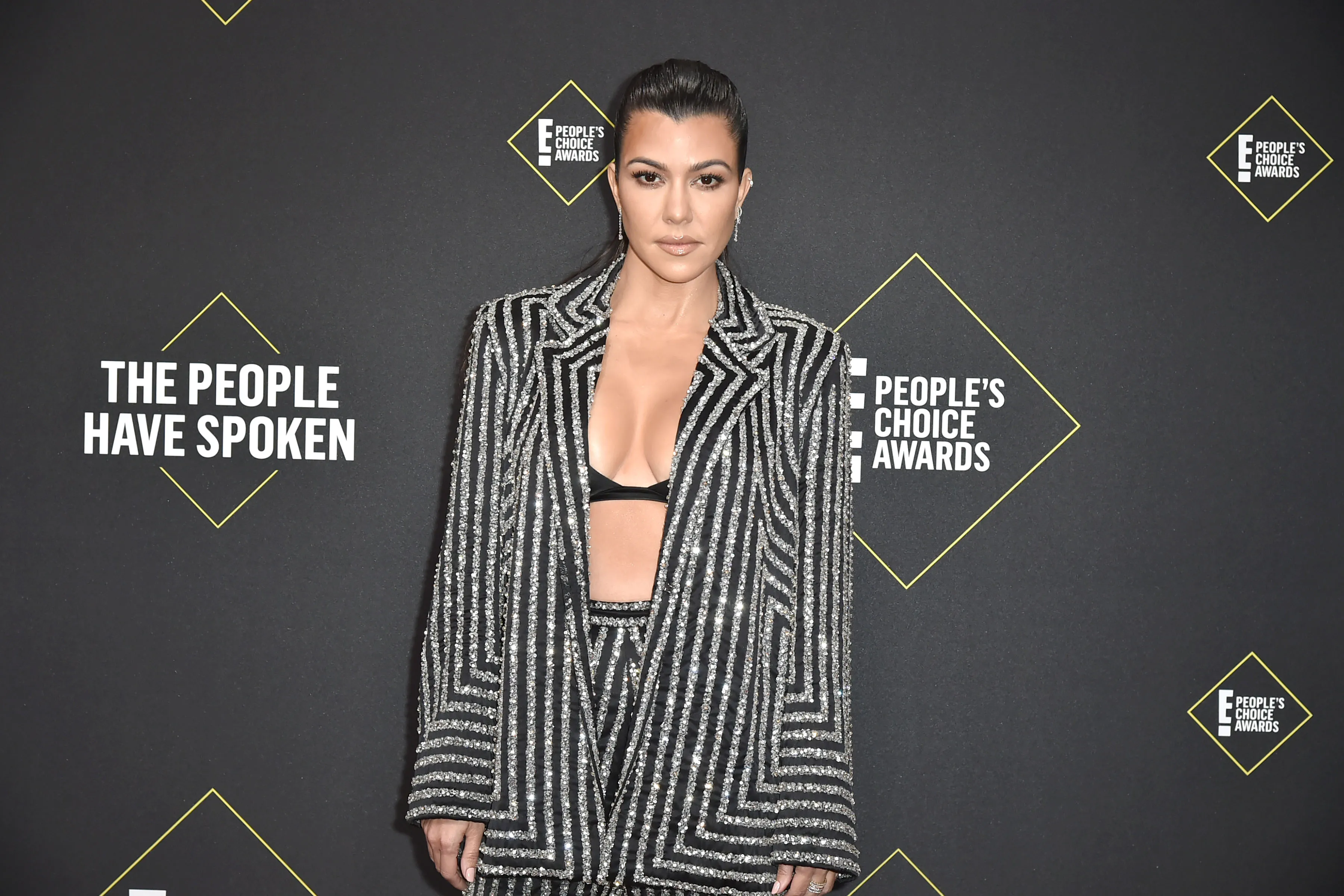 SANTA MONICA, CALIFORNIA - NOVEMBER 10: Kourtney Kardashian attends 2019 E! People's Choice Awards - Arrivals at The Barker Hanger on November 10, 2019 in Santa Monica, California. (Photo by David Crotty/Patrick McMullan via Getty Images)