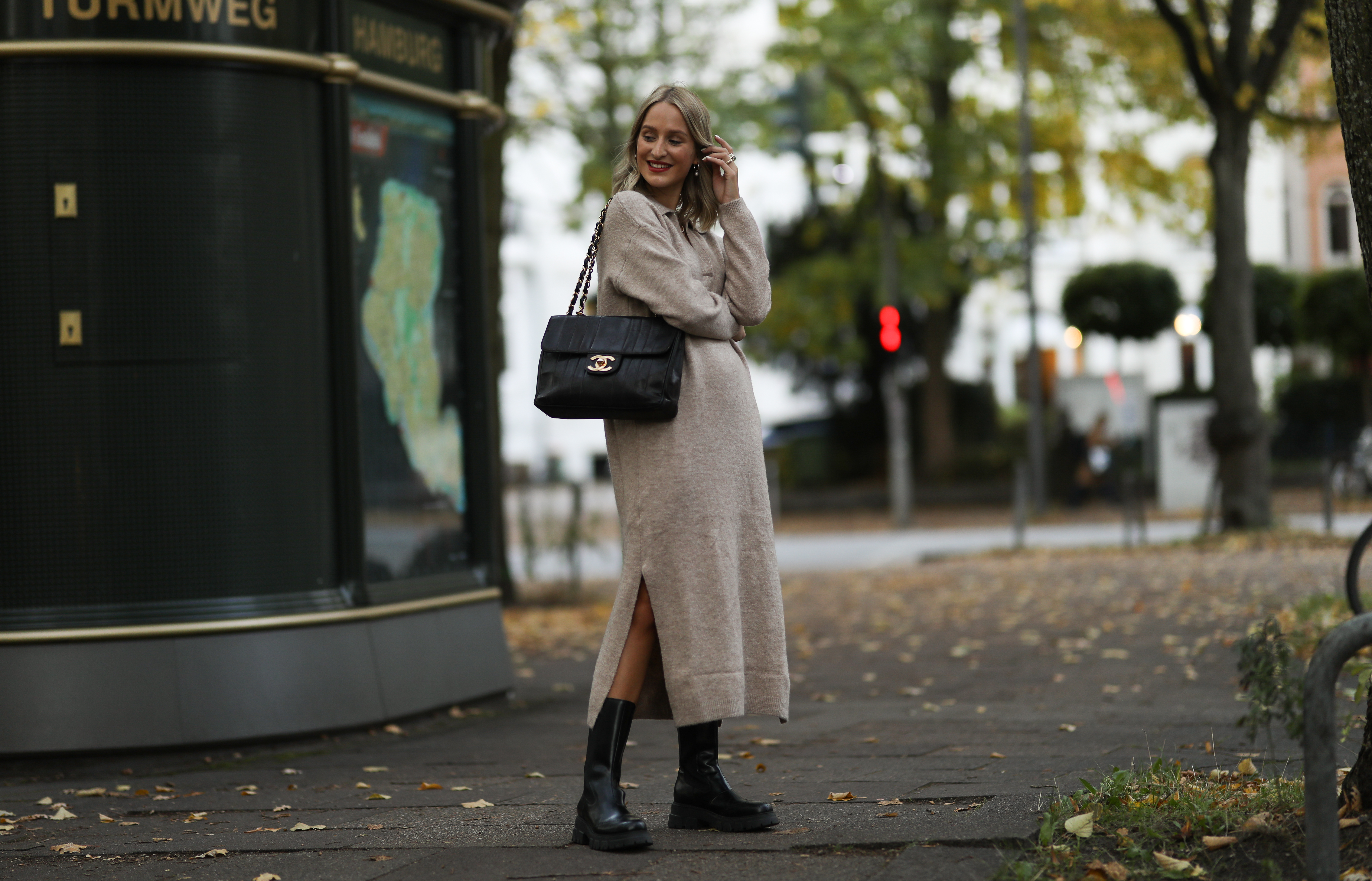 Louisa Theresa Grass wearing Mango knit dress, Nakd boots and Chanel bag on October 22, 2020 in Hamburg, Germany.