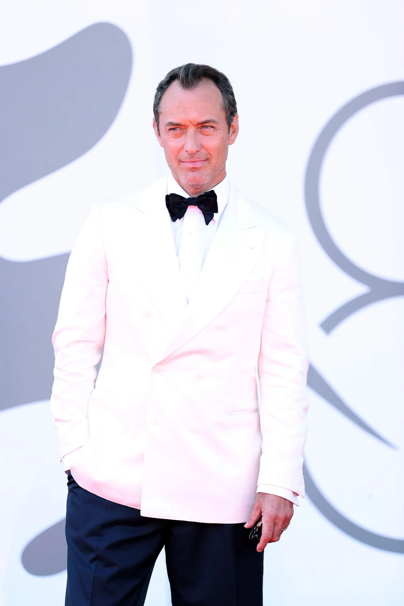 GettyImages2233033537 Jude Law Slips and Takes a Tumble While Getting Off Water Taxi in Venice