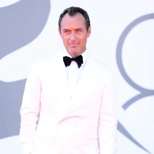 GettyImages2233033537 Jude Law Slips and Takes a Tumble While Getting Off Water Taxi in Venice