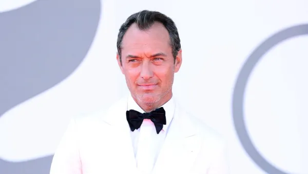 GettyImages2233033537 Jude Law Slips and Takes a Tumble While Getting Off Water Taxi in Venice