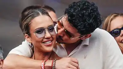 Jessica Alba and Danny Ramirez Get Handsy at US Open Kiss in New Photos