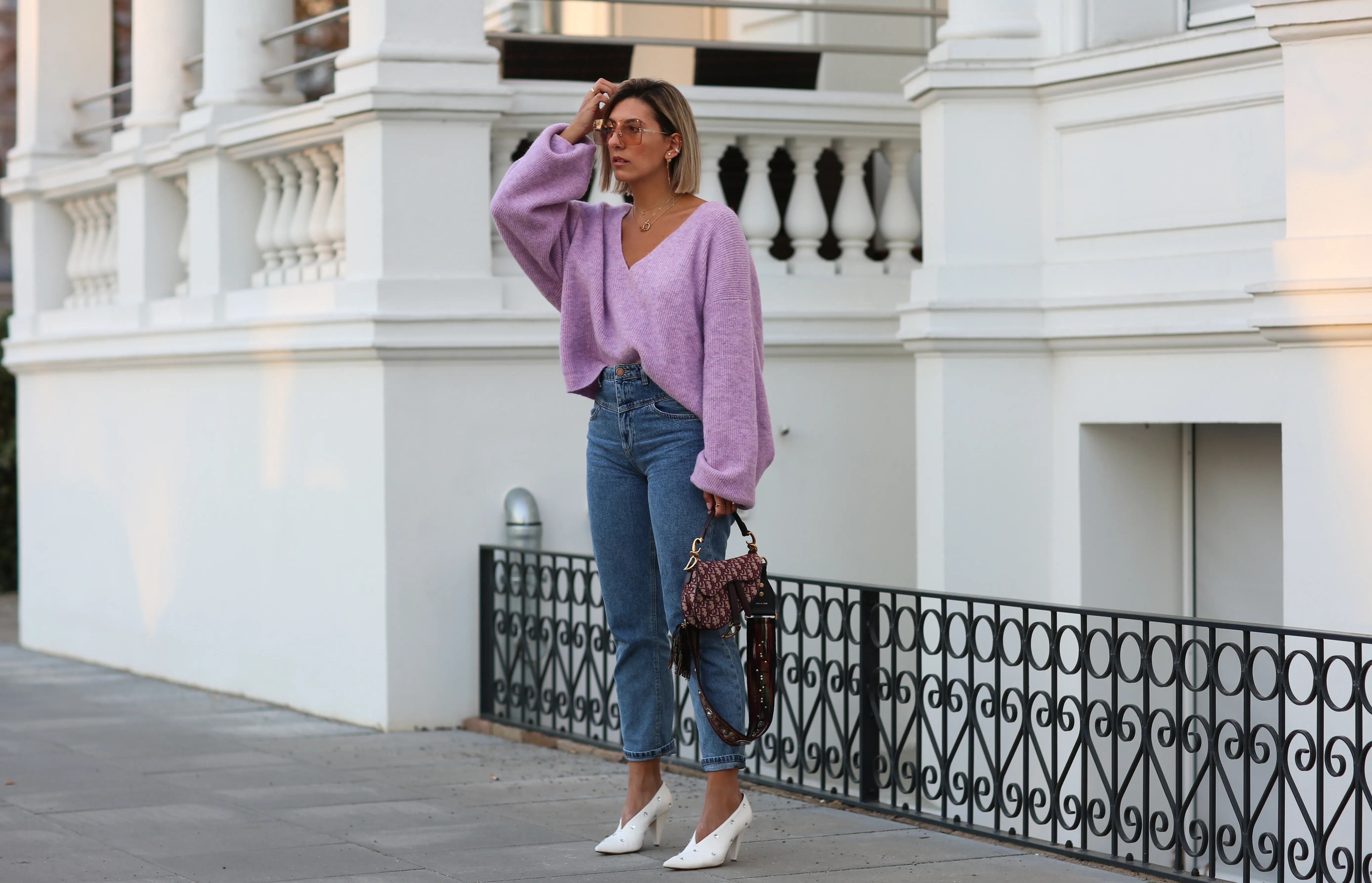 HAMBURG, GERMANY - FEBRUARY 18: Aylin Koenig wearing Stradivarius jeans, Celine shoes, Dior bag, by Aylin Koenig sweater, Dior sunglasses on February 18, 2019 in Hamburg, Germany. (Photo by Jeremy Moeller/Getty Images)
