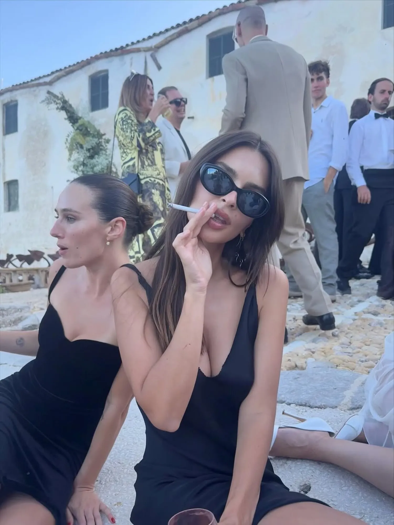 Emily Ratajkowski Goes 'Skinny Dipping' and Wears Slinky Black Dress as She Enjoys 'Party Girl Week'