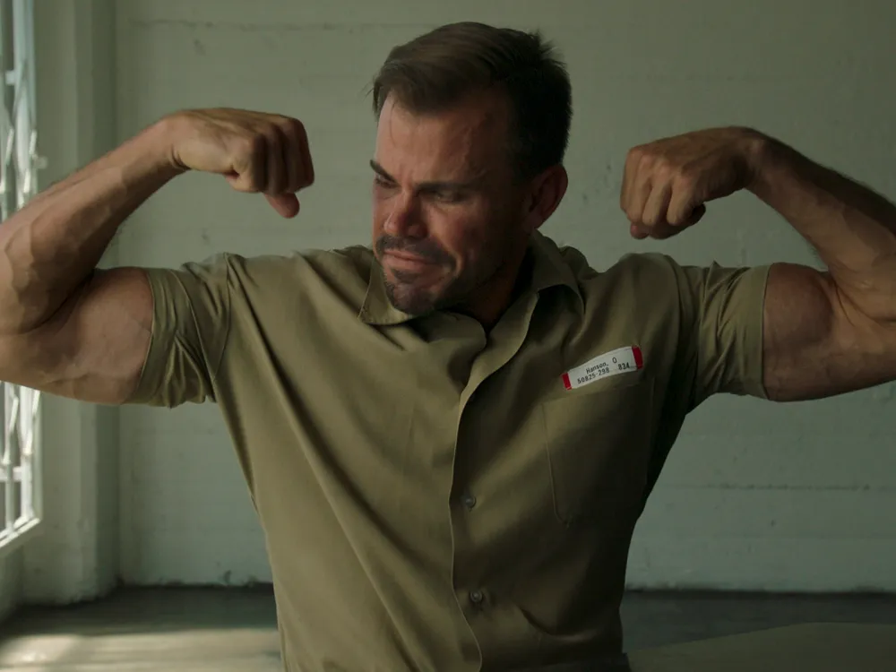 Owen Hanson shows his muscles in Cocaine Quarterback