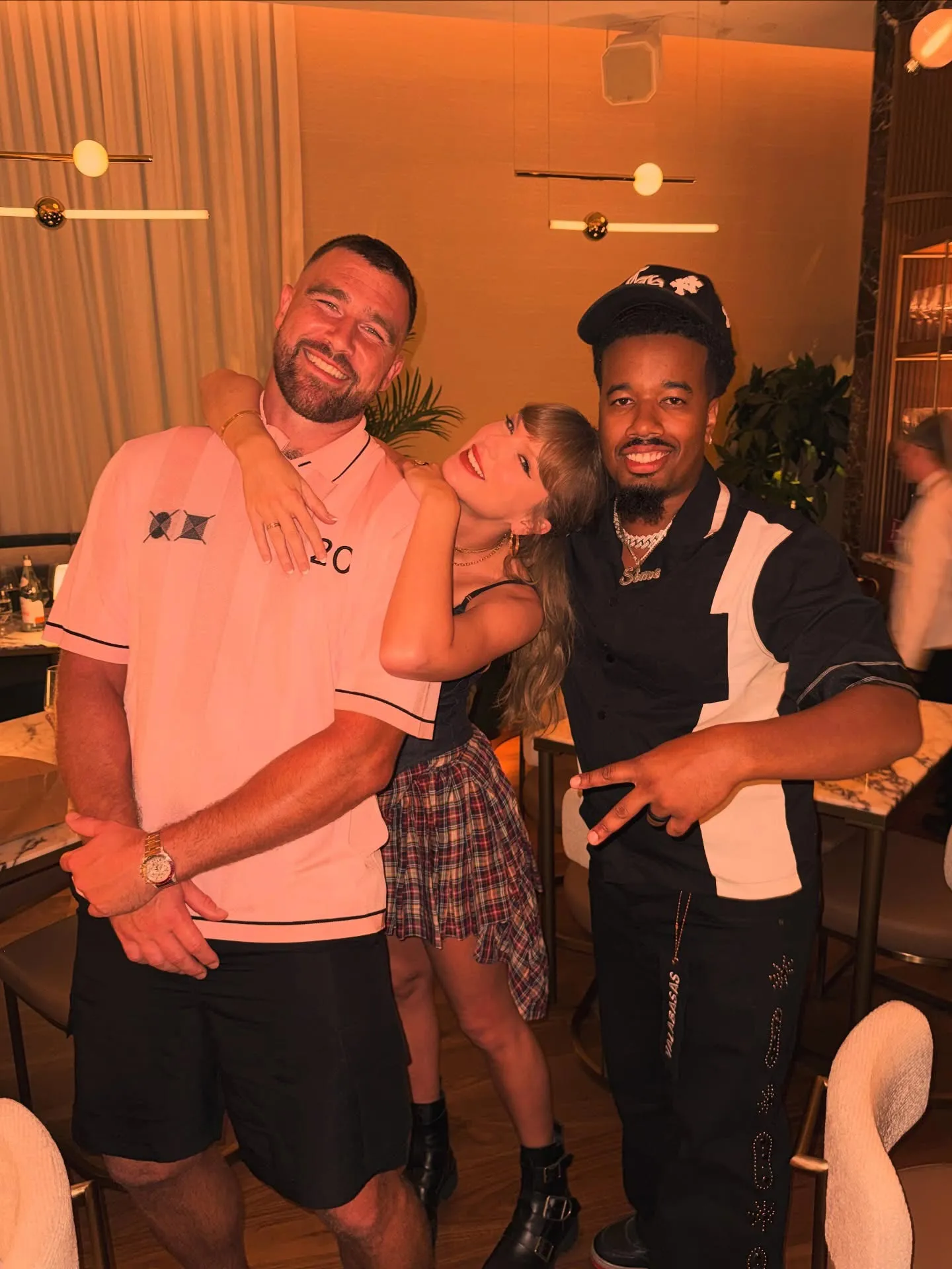 Taylor Swift Rocks Plaid Miniskirt and Crop Top as She Cozies Up to Travis Kelce Ahead of Album Release