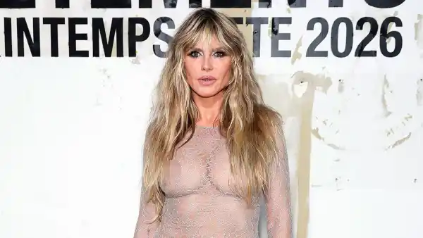 Feature Heidi Klum Rocks Nipple Baring Sheer Lace Gown and Gold Grill During Paris Fashion Week Event