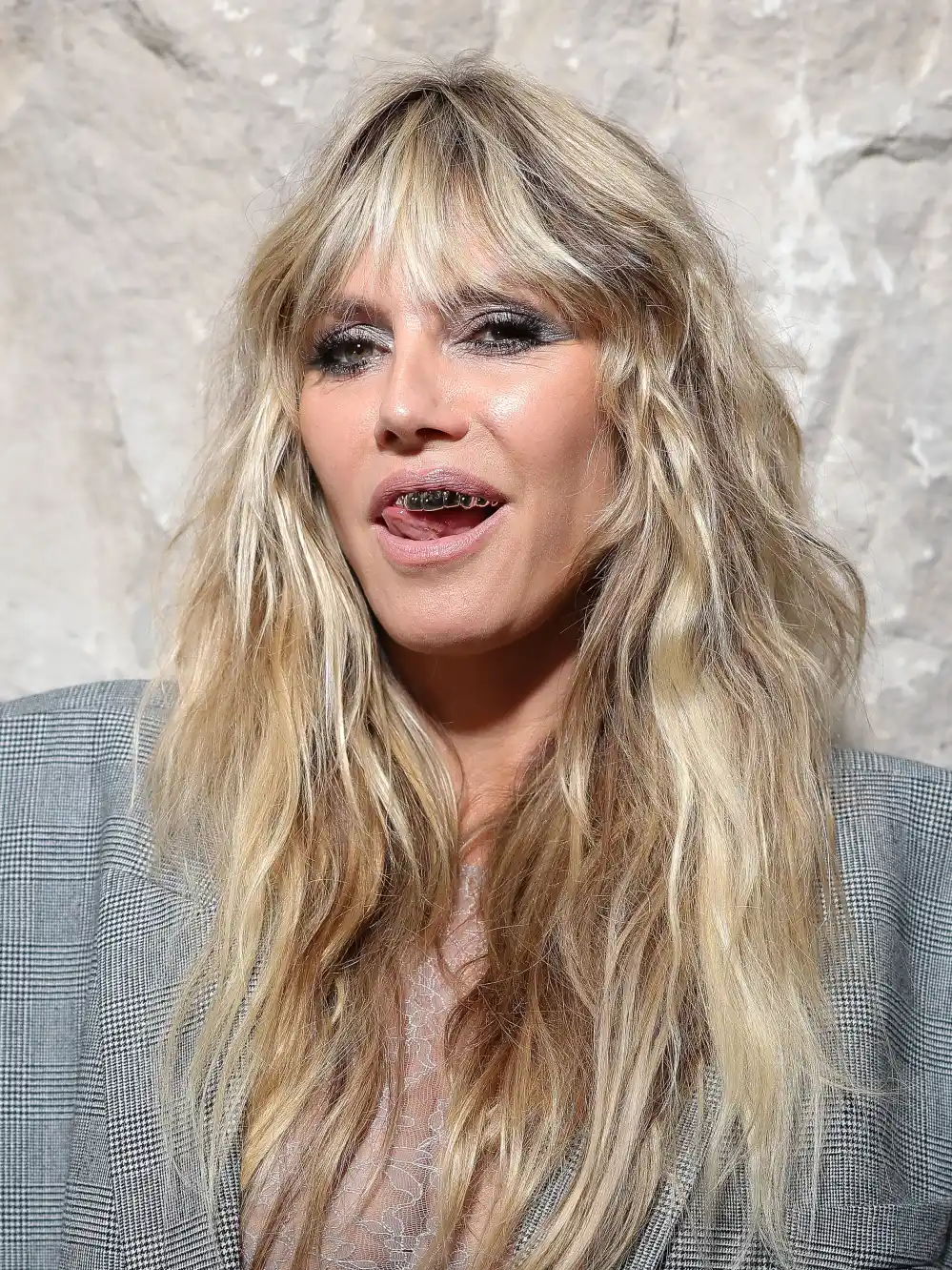 Heidi Klum Rocks Nipple Baring Sheer Lace Gown and Gold Grill During Paris Fashion Week Event