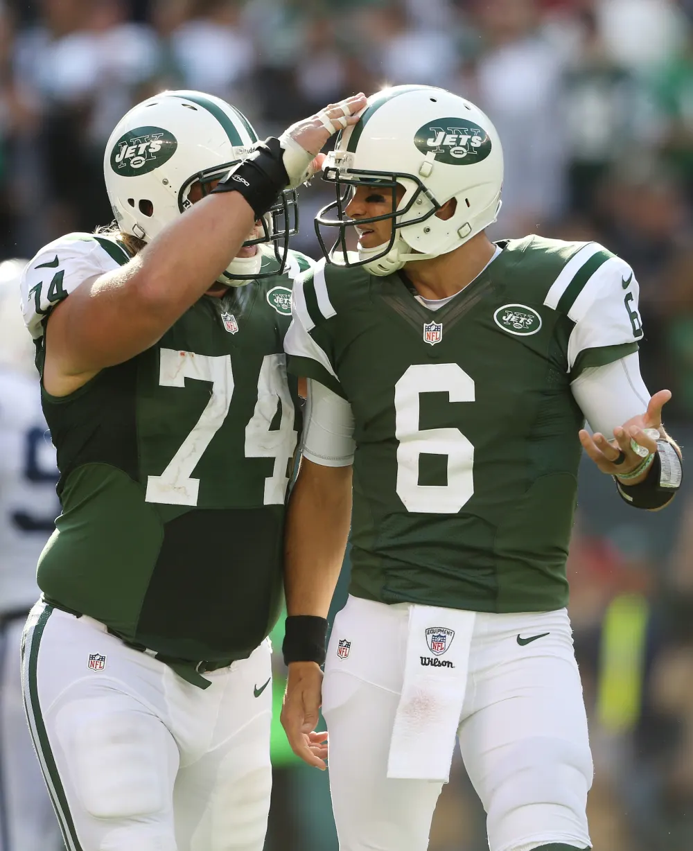 Mark-Sanchez-and-Nick-Mangold-GettyImages-154119997