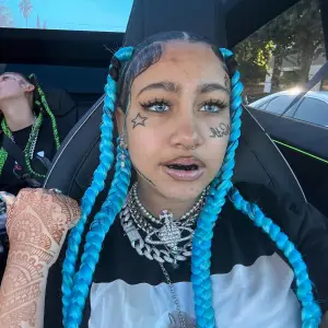 North West Debuts Faux Piercings and Tattoos 001