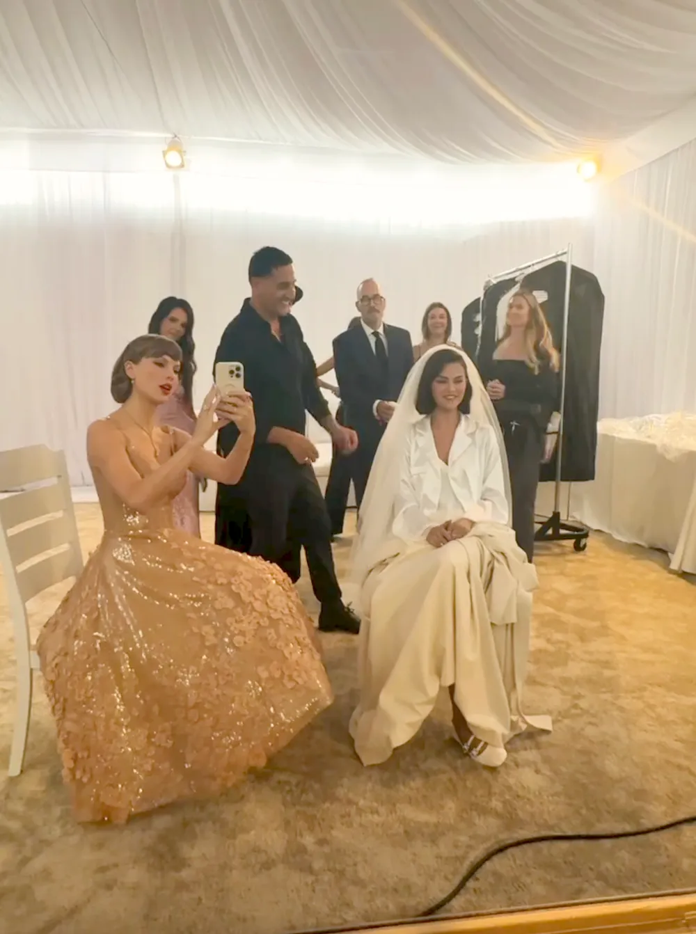 Taylor Swiftns Oscar de la Renta Gown at Selena Gomez s Wedding Revealed Blessed to Have You by My Side