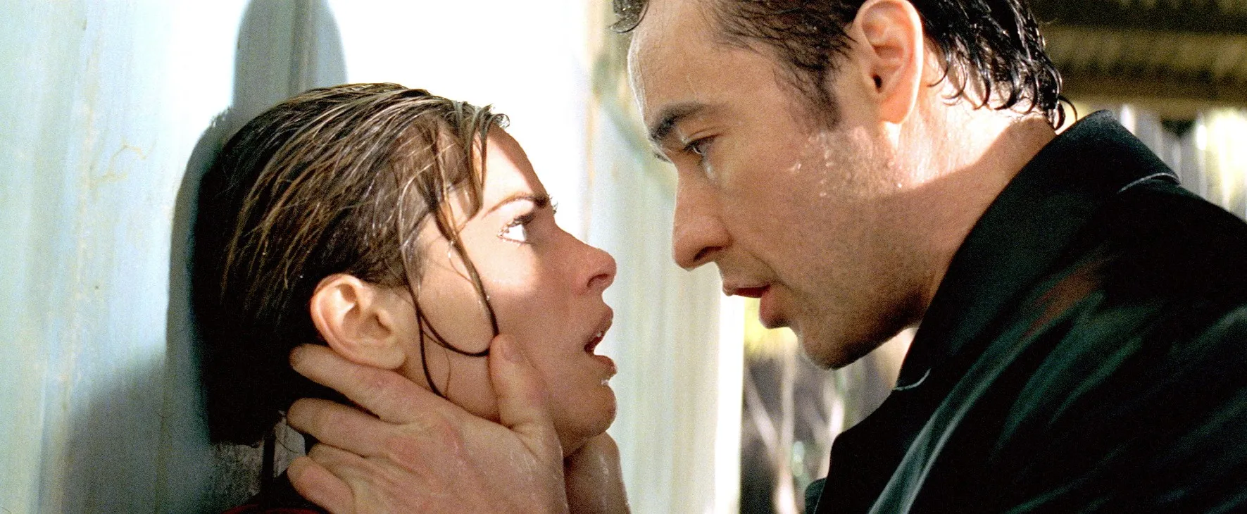 Amanda Peet and John Cusack in Identity